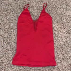 Stretchy tank top with mesh v neck